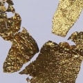 Which toxic element is used for extracting gold?