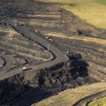 What pollutants does mining release?